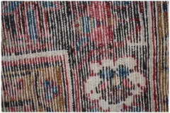 Close-up of a handwoven vintage Persian rug featuring intricate floral patterns in wool.