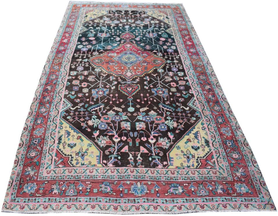 A rectangular handmade Persian rug featuring a dark brown field with colorful floral motifs.