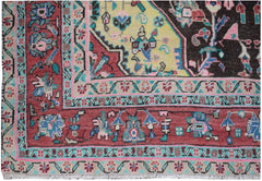 A handmade vintage Persian wool rug featuring a geometric floral pattern in red, yellow, and black.