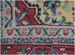 A close-up of a vintage Persian rug featuring intricate floral patterns in red, yellow, and teal.