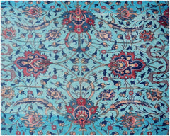 A vintage Persian rug featuring an intricate floral pattern in shades of blue, red, and cream.