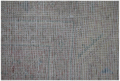 A handwoven vintage Persian rug featuring intricate traditional patterns in wool.