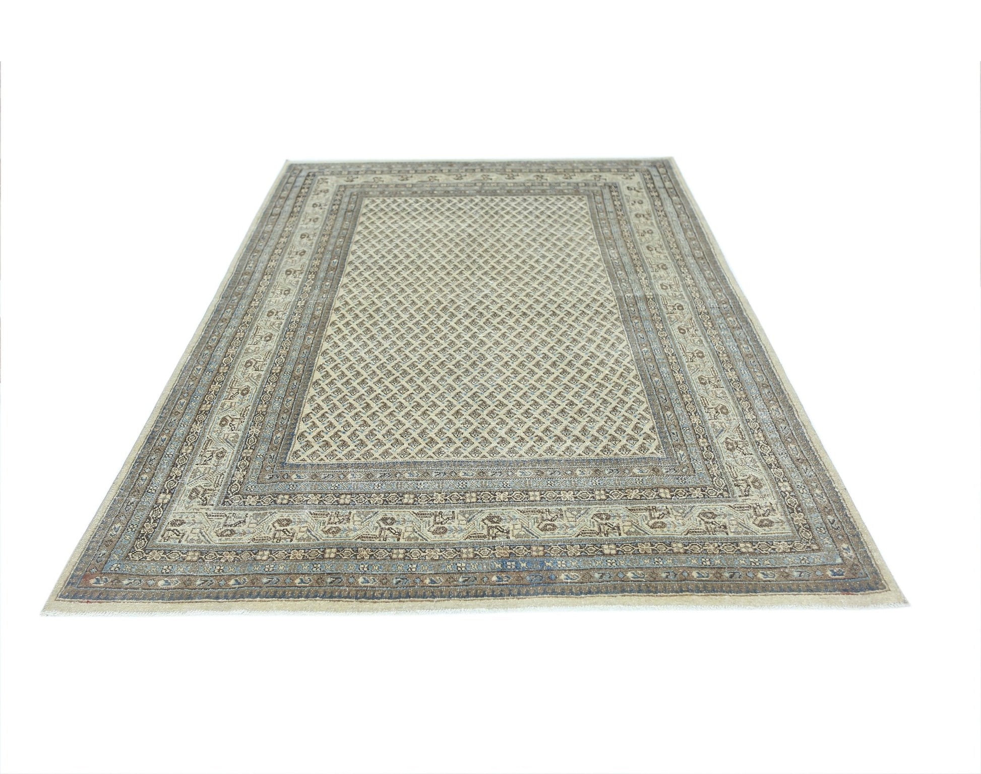 A vintage Persian Saraband rug featuring a repeating geometric pattern in neutral tones.