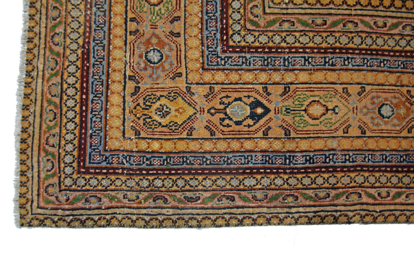 A vintage Persian Saraband rug featuring a geometric border and intricate floral patterns.
