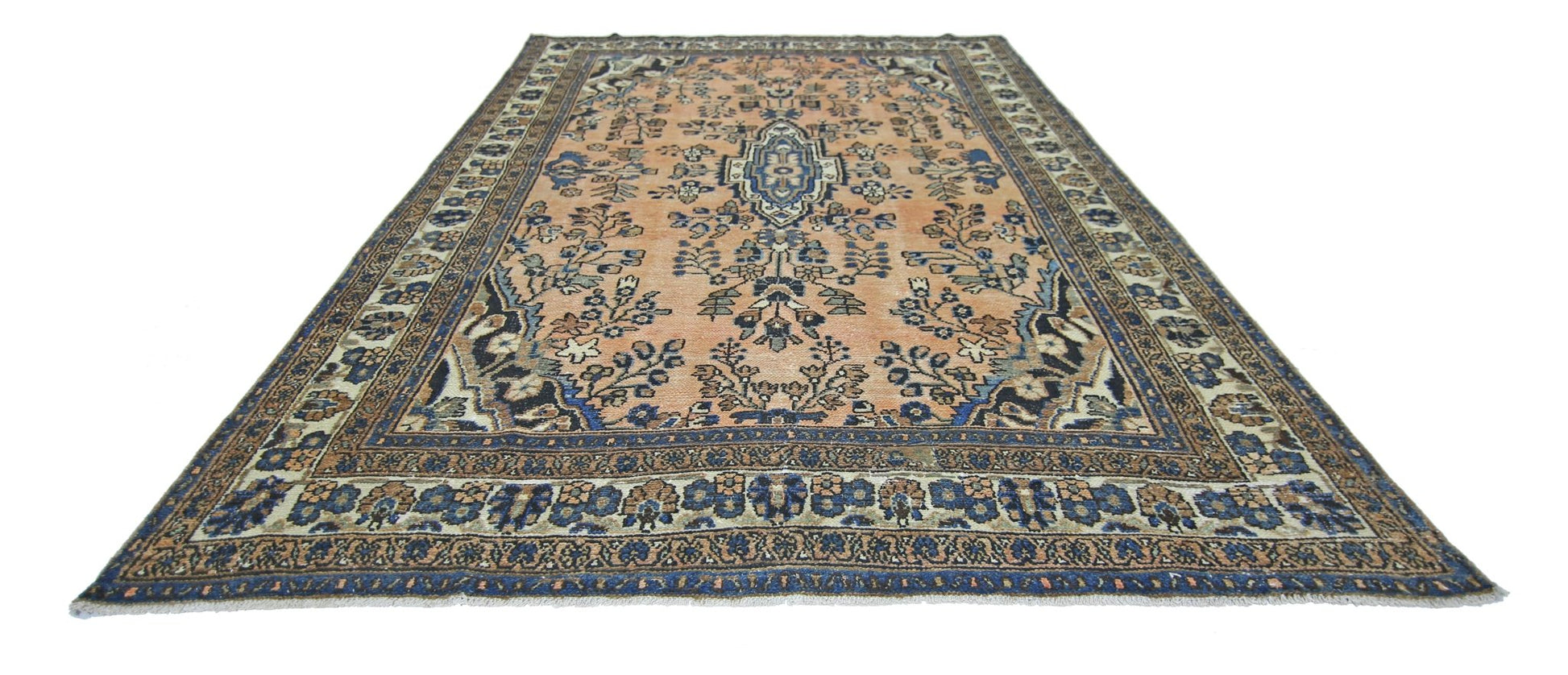 A vintage Persian Sarouk rug featuring a floral pattern in blue and peach tones.
