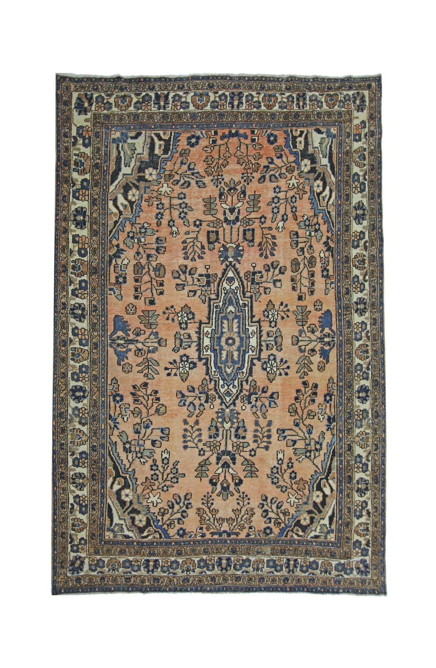 A vintage Persian Sarouk rug featuring a central floral medallion on a peach field with blue accents.