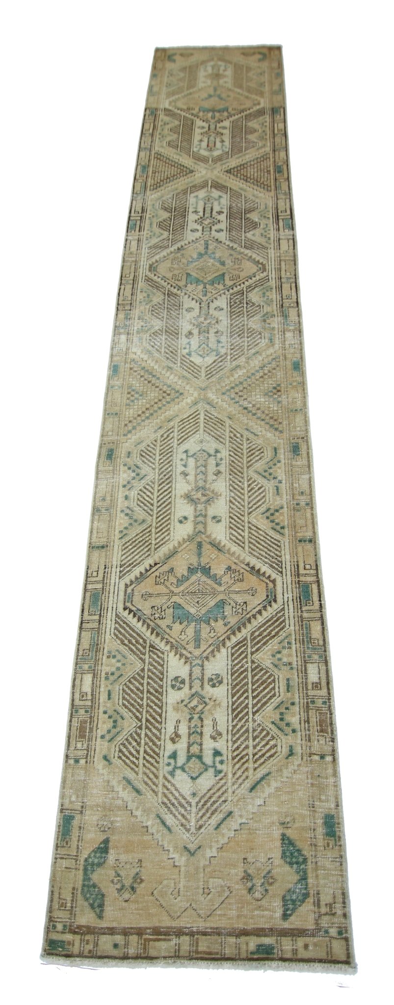 A vintage Persian Serab runner rug featuring geometric patterns in muted blue and brown tones.