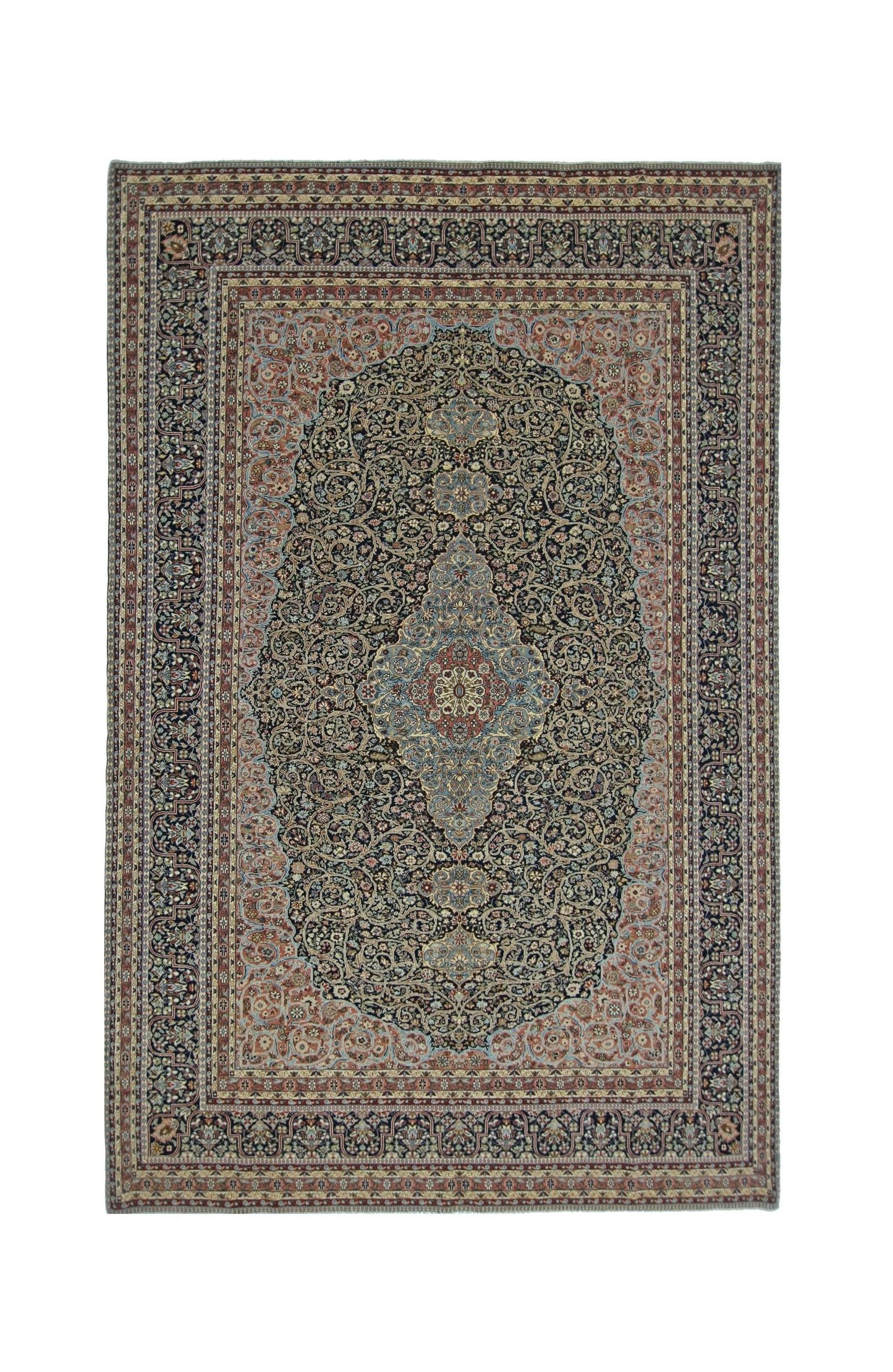 A vintage Persian Tabriz rug featuring an intricate floral medallion on a dark navy field.