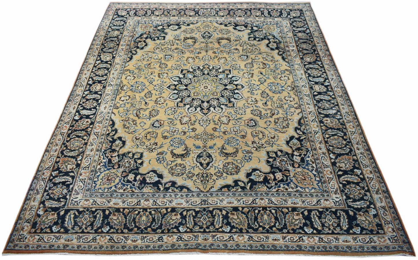 Vintage Persian Kerman rug featuring a central medallion and intricate floral patterns.