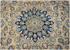 A vintage Persian Kerman rug featuring an intricate floral medallion on a soft gold background.