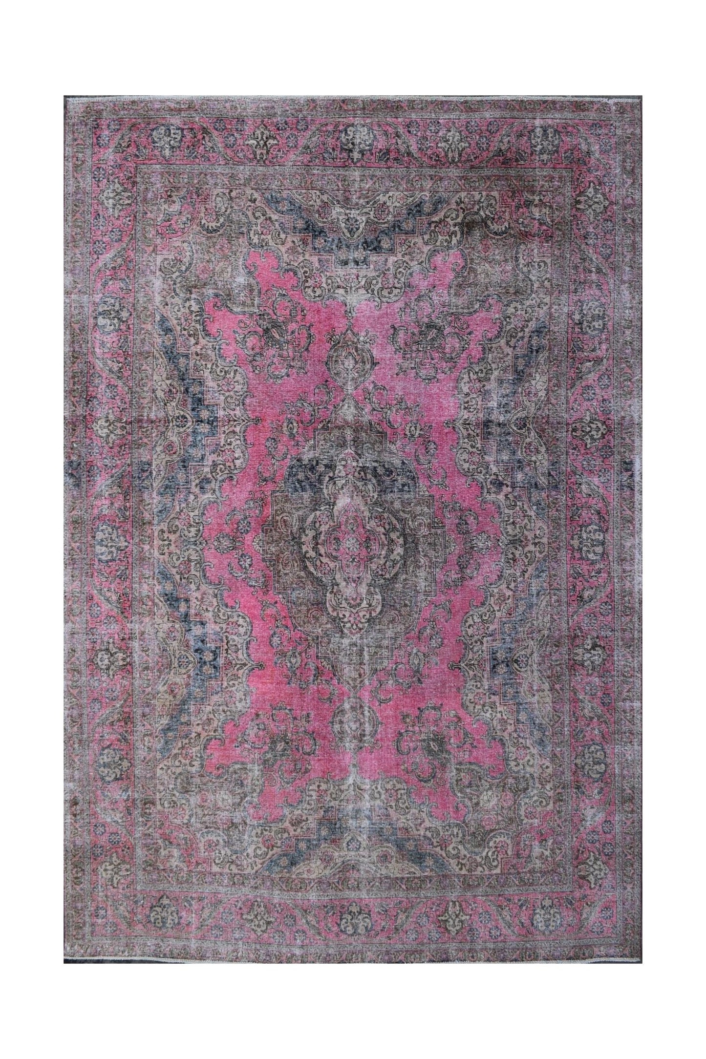 A vintage Persian Tabriz rug featuring intricate floral patterns in shades of pink and grey.