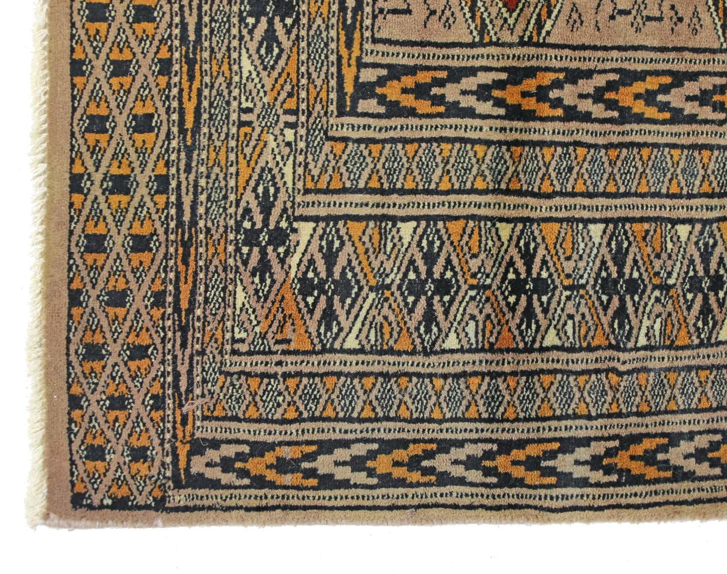 A vintage Pakistani Princess Bokhara rug featuring intricate geometric patterns in orange and black.