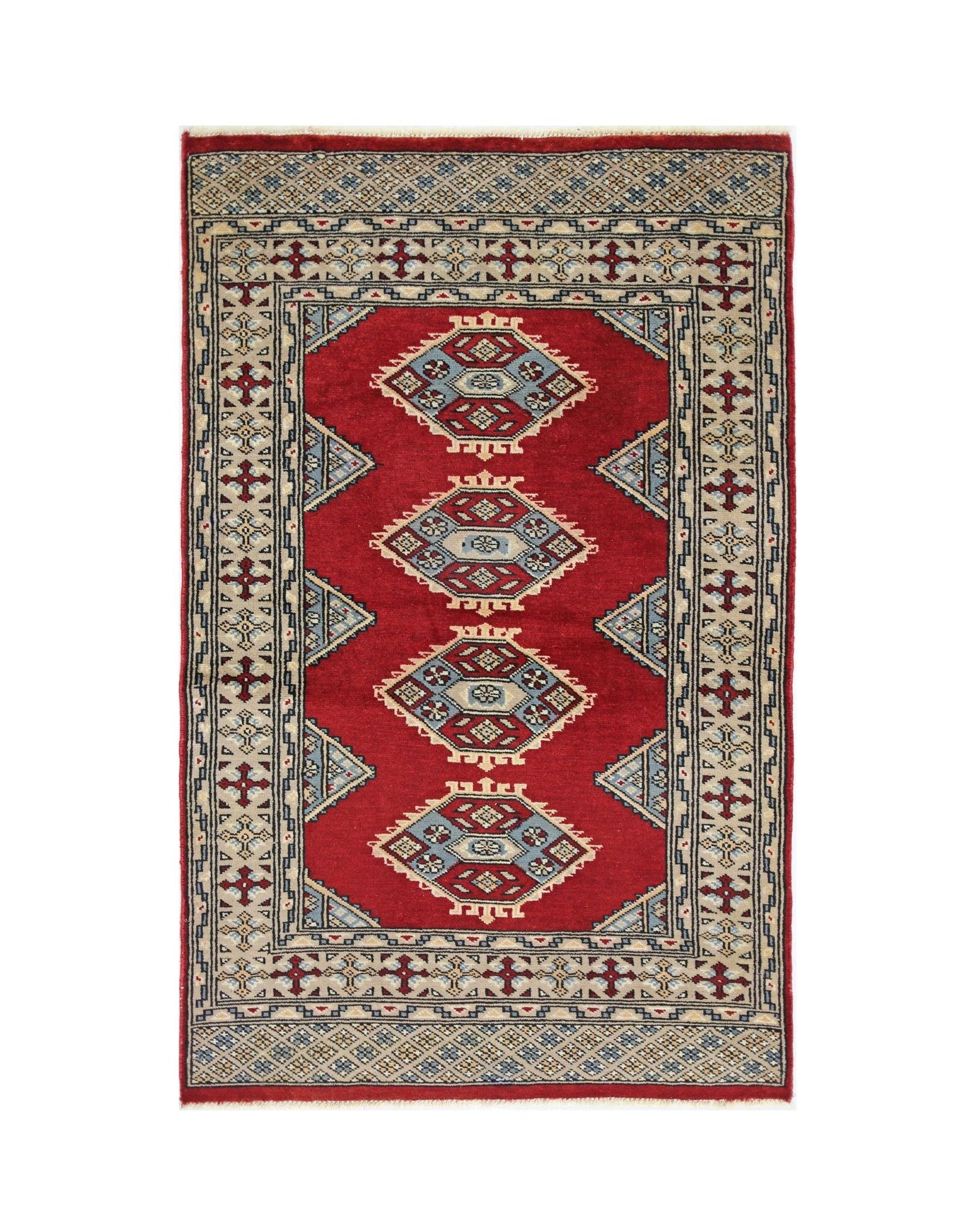 A vintage Pakistani Princess Bokhara rug featuring four geometric medallions on a red field.