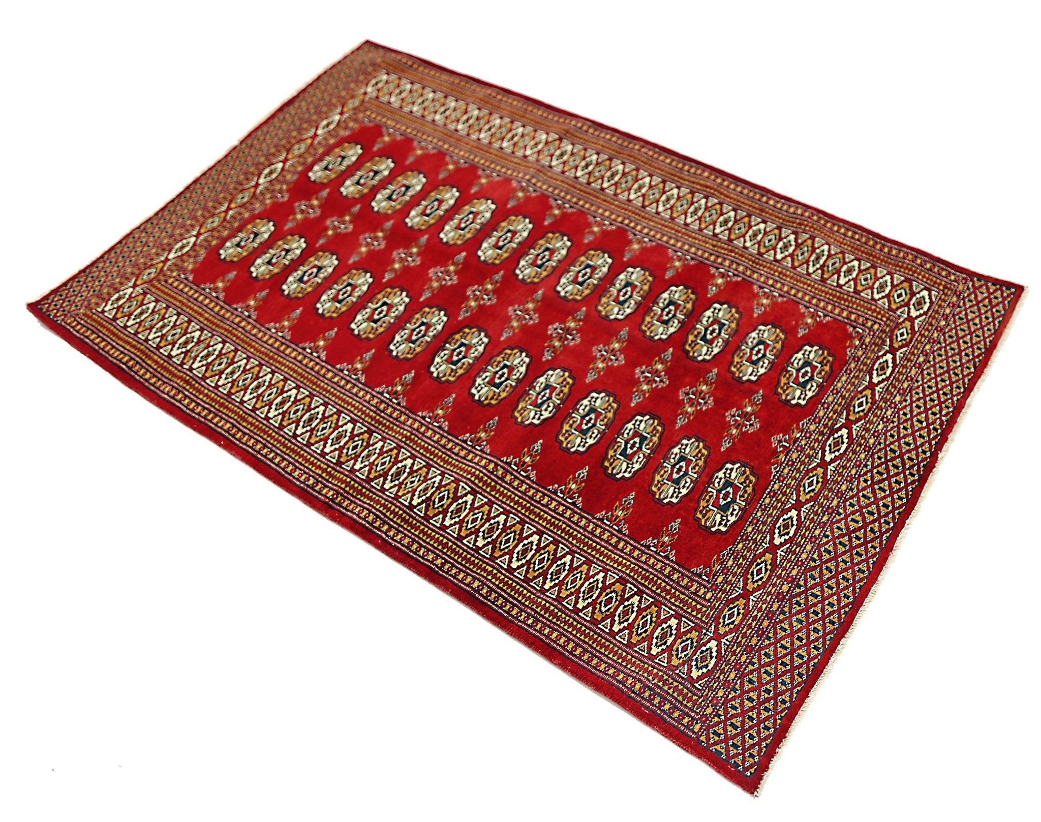 A vintage Pakistani Princess Bokhara rug featuring a red field with repeating geometric motifs.