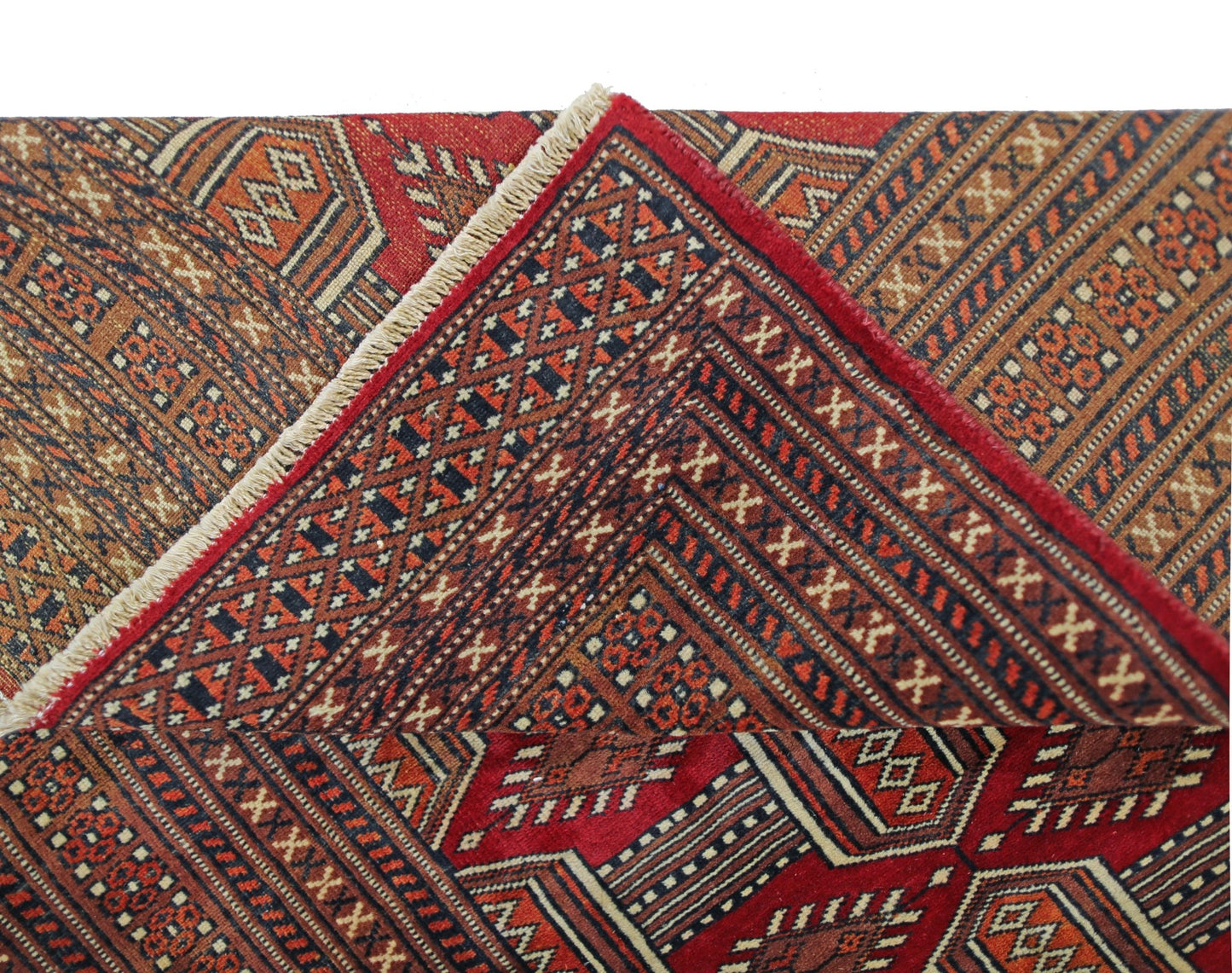 A vintage Pakistani Princess Bokhara rug featuring a geometric red and dark blue pattern.