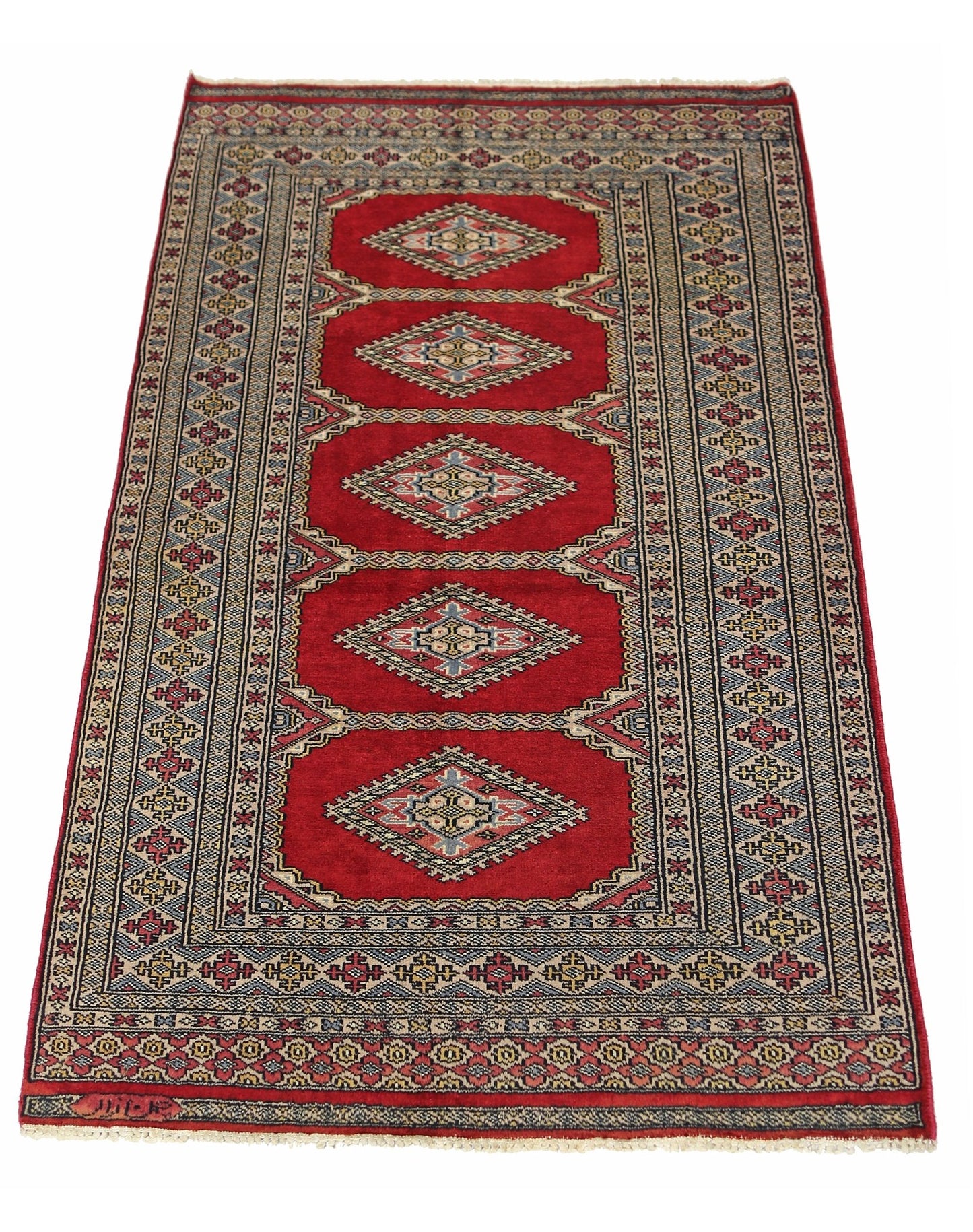 A vintage Pakistani Princess Bokhara rug featuring five diamond medallions on a vibrant red field.