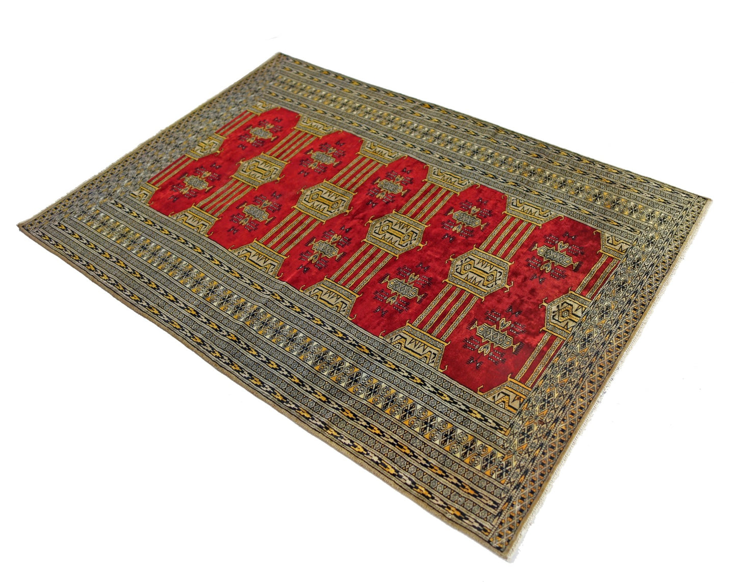 A vintage Pakistani Princess Bokhara rug featuring a red field with repeating geometric motifs.