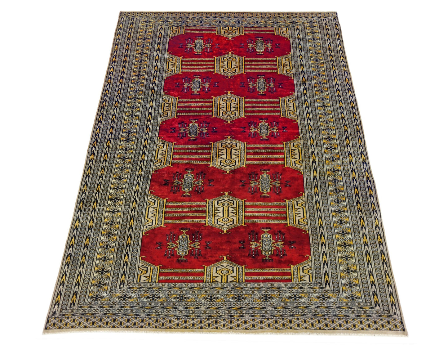 A vintage Pakistani Princess Bokhara rug featuring a deep red field with repeating geometric motifs.