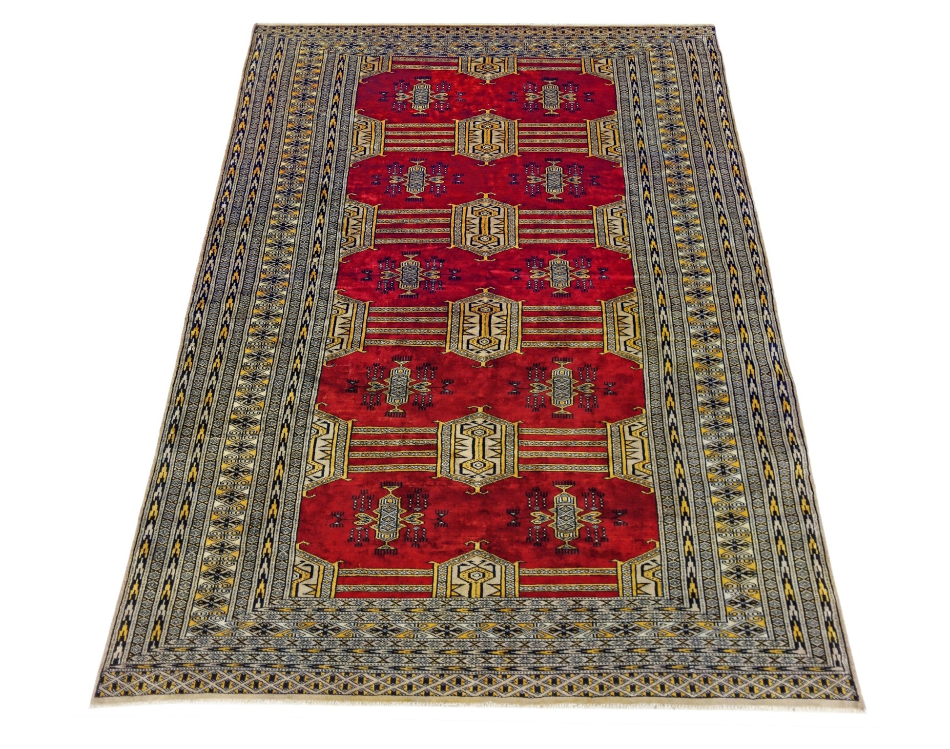 A vintage Pakistani Princess Bokhara rug featuring a deep red field with repeating geometric motifs.