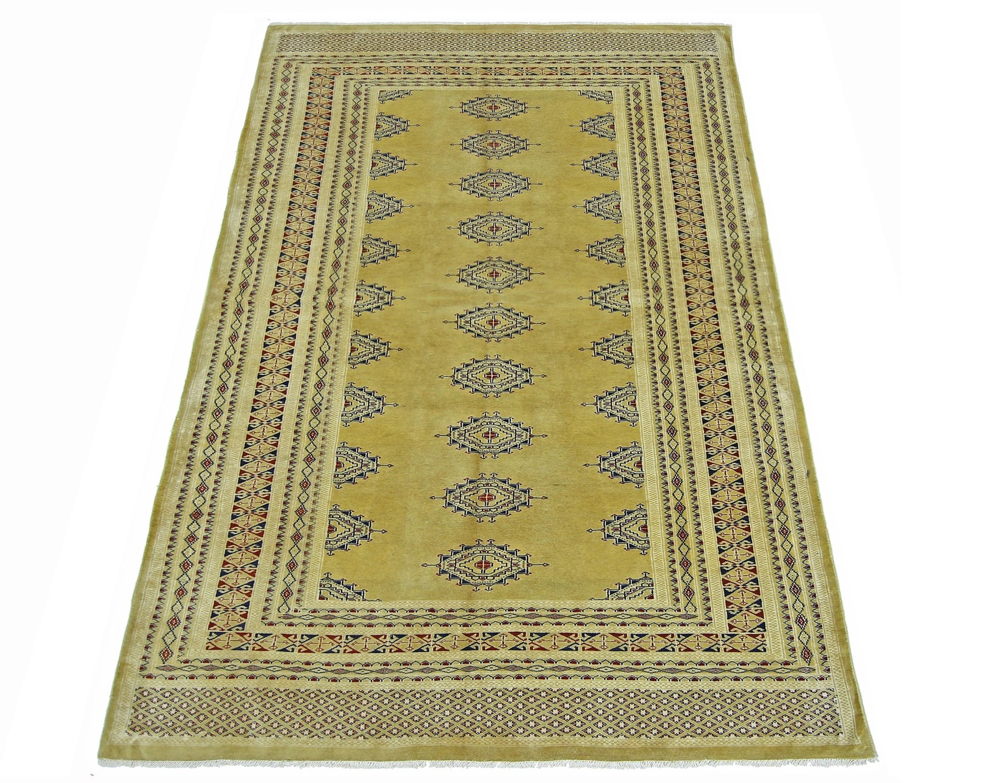 A vintage Pakistani Princess Bokhara rug featuring a golden field with repeating geometric motifs.