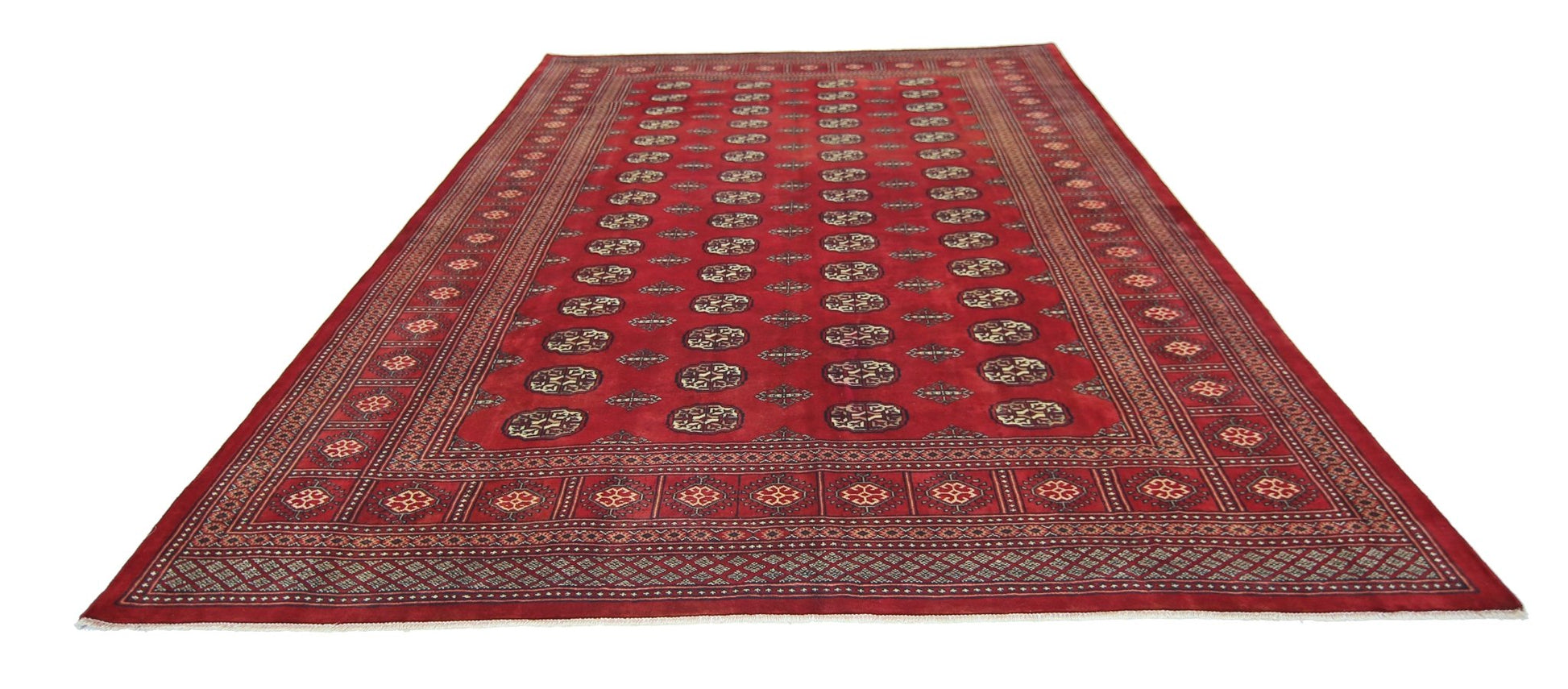 A vintage Pakistani Princess Bokhara rug featuring a repeating geometric pattern in deep red.