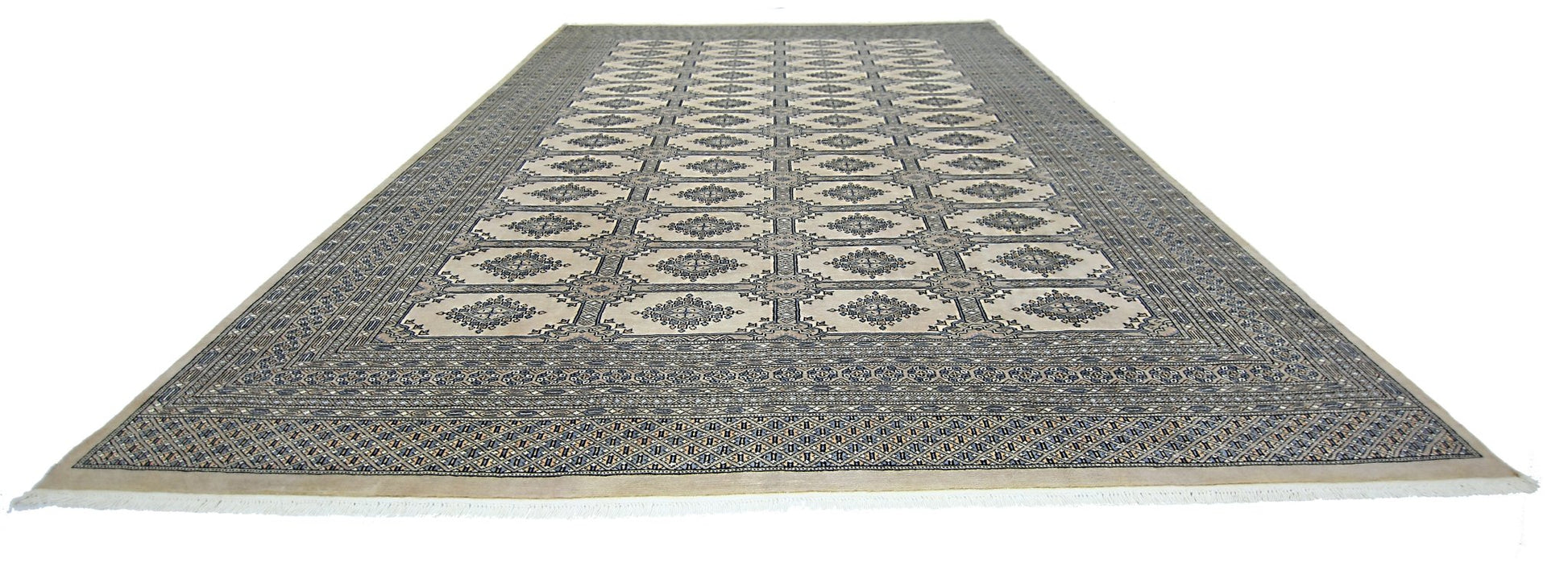 A vintage Pakistani Princess Bokhara rug featuring a repeating geometric pattern in wool.