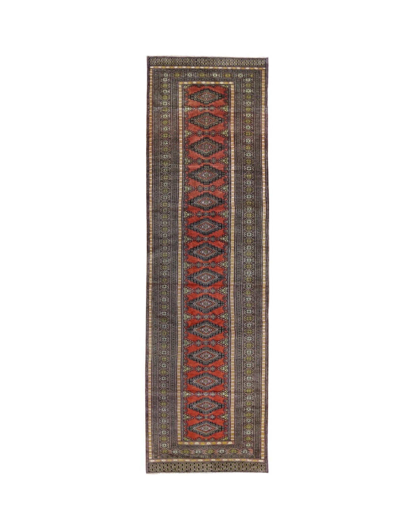 A vintage Pakistani runner rug featuring a repeating geometric pattern in red and dark tones.