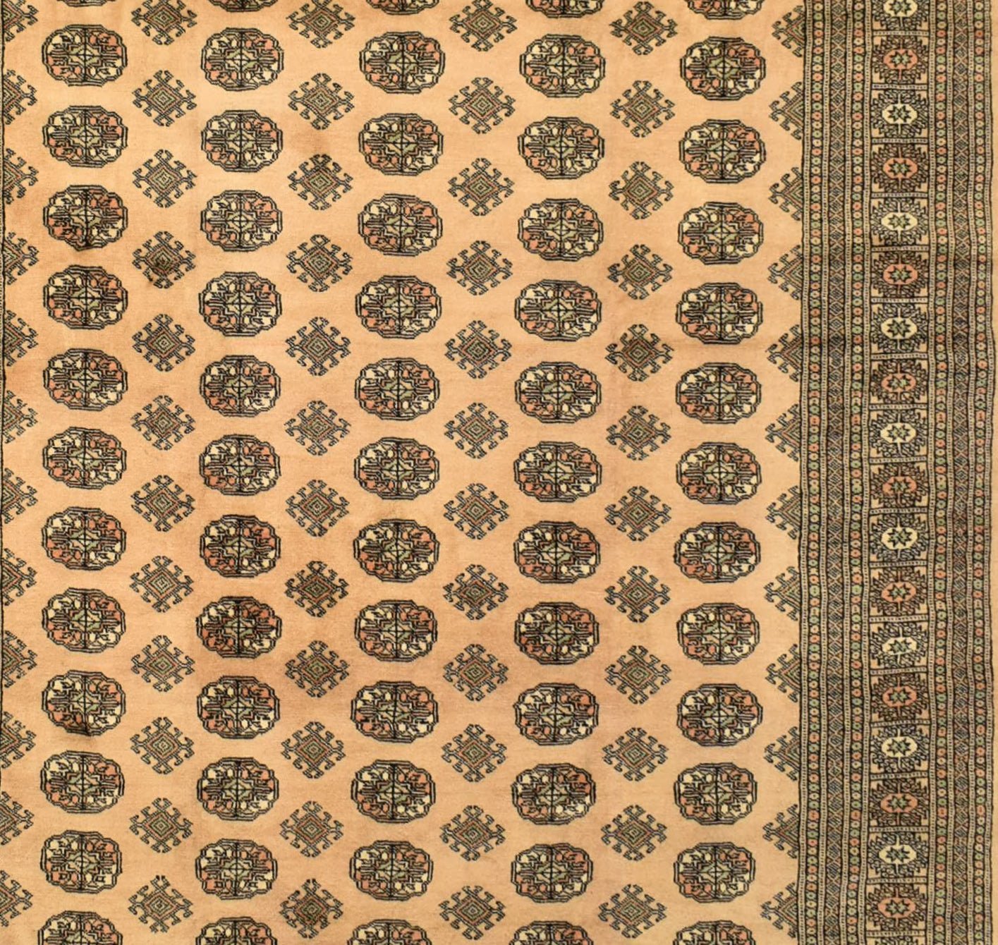 Vintage Princess Bokhara runner with a repeating geometric pattern in shades of peach and brown.