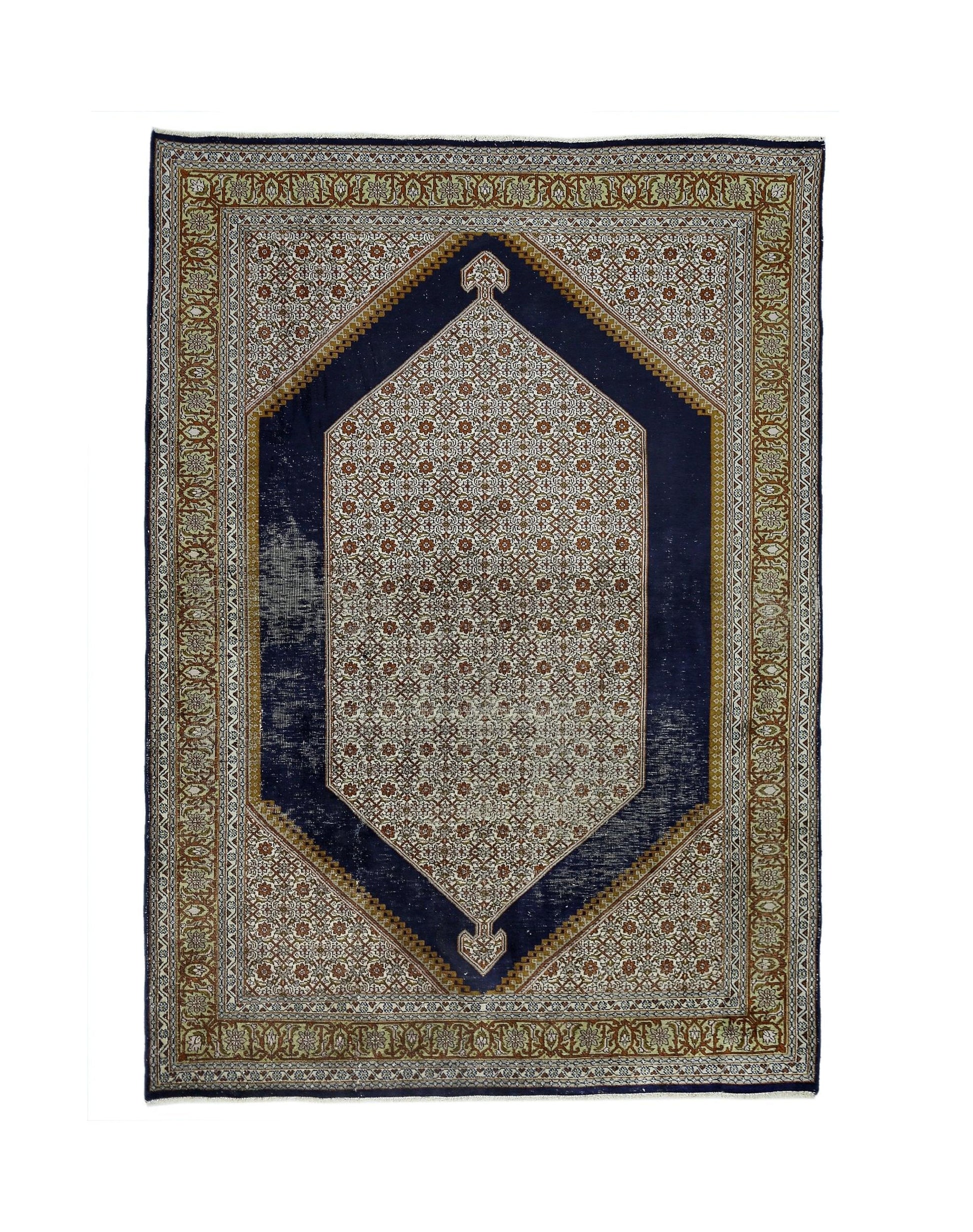 A vintage handmade Kashmiri silk rug featuring a central floral medallion on a dark blue field.