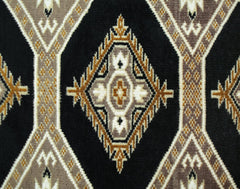 A vintage Pakistani Princess Bokhara rug featuring a repeating geometric diamond pattern in black, brown, and cream.