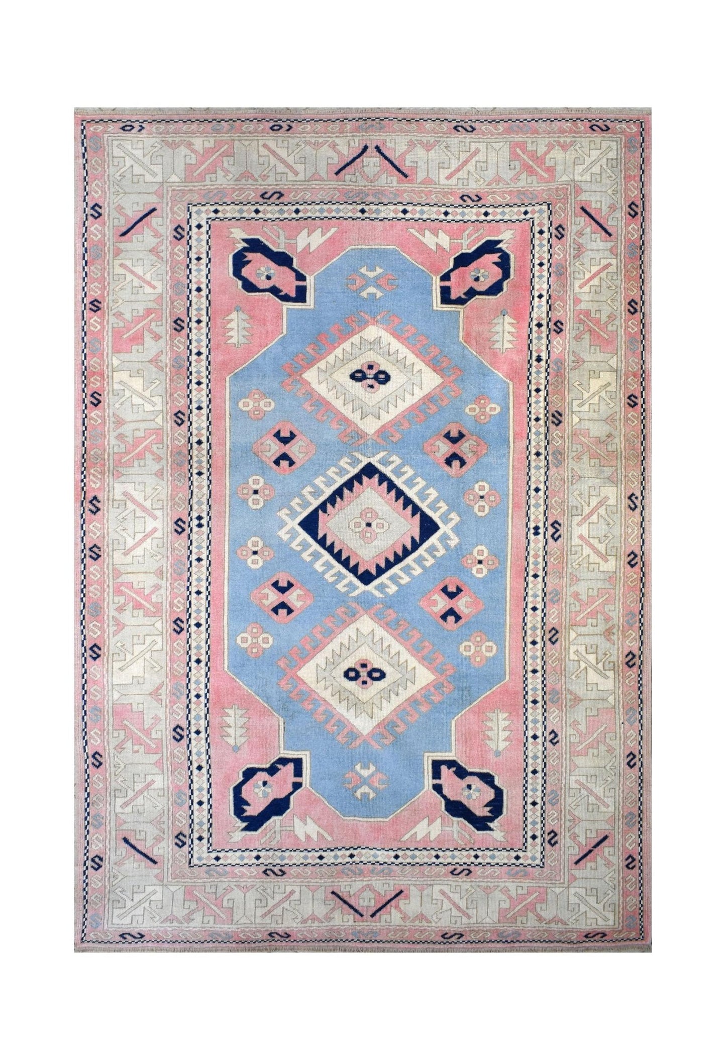 Handmade vintage Turkish Oushak rug featuring a blue central medallion on a pink field.