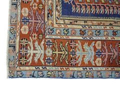 A vintage Persian prayer rug featuring intricate geometric and floral patterns in vibrant colors.