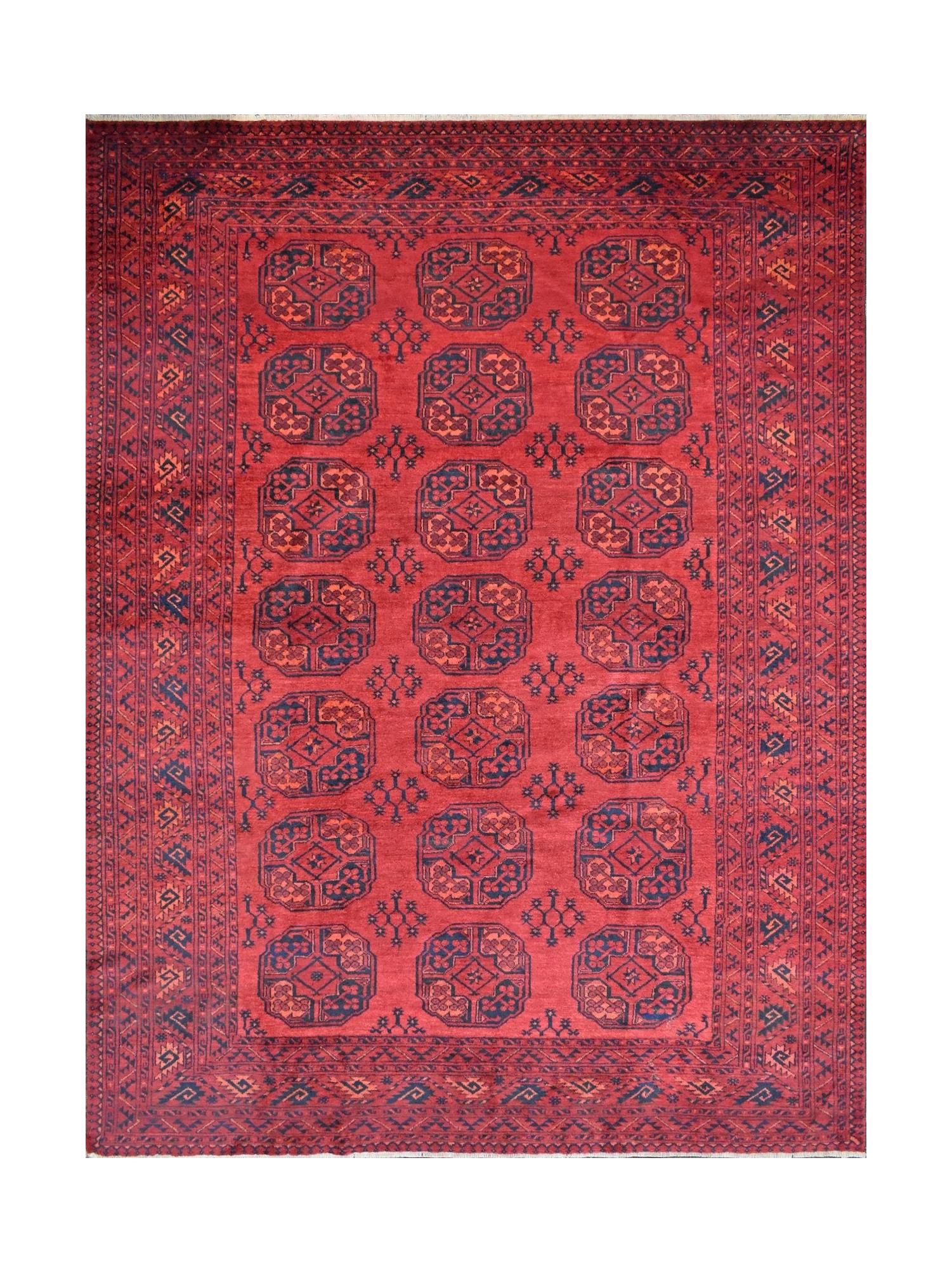 A vintage handmade Afghan Turkmen rug featuring a repeating geometric gul pattern in red and blue.