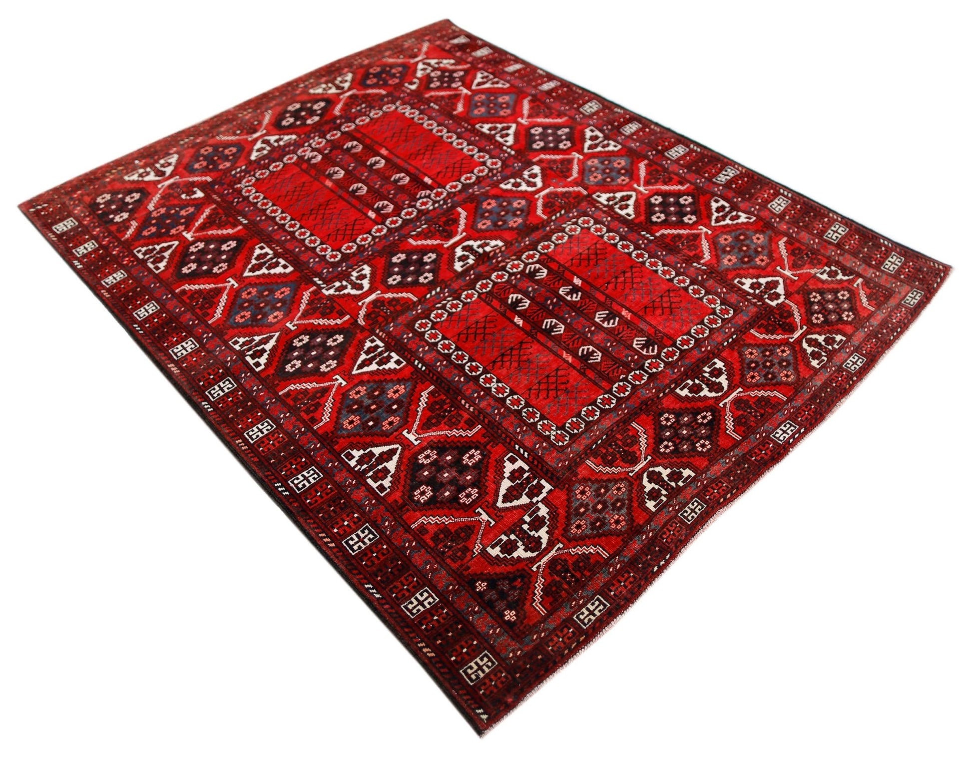 A handwoven vintage Afghan Turkmen Engsi rug featuring geometric patterns in red and dark blue.