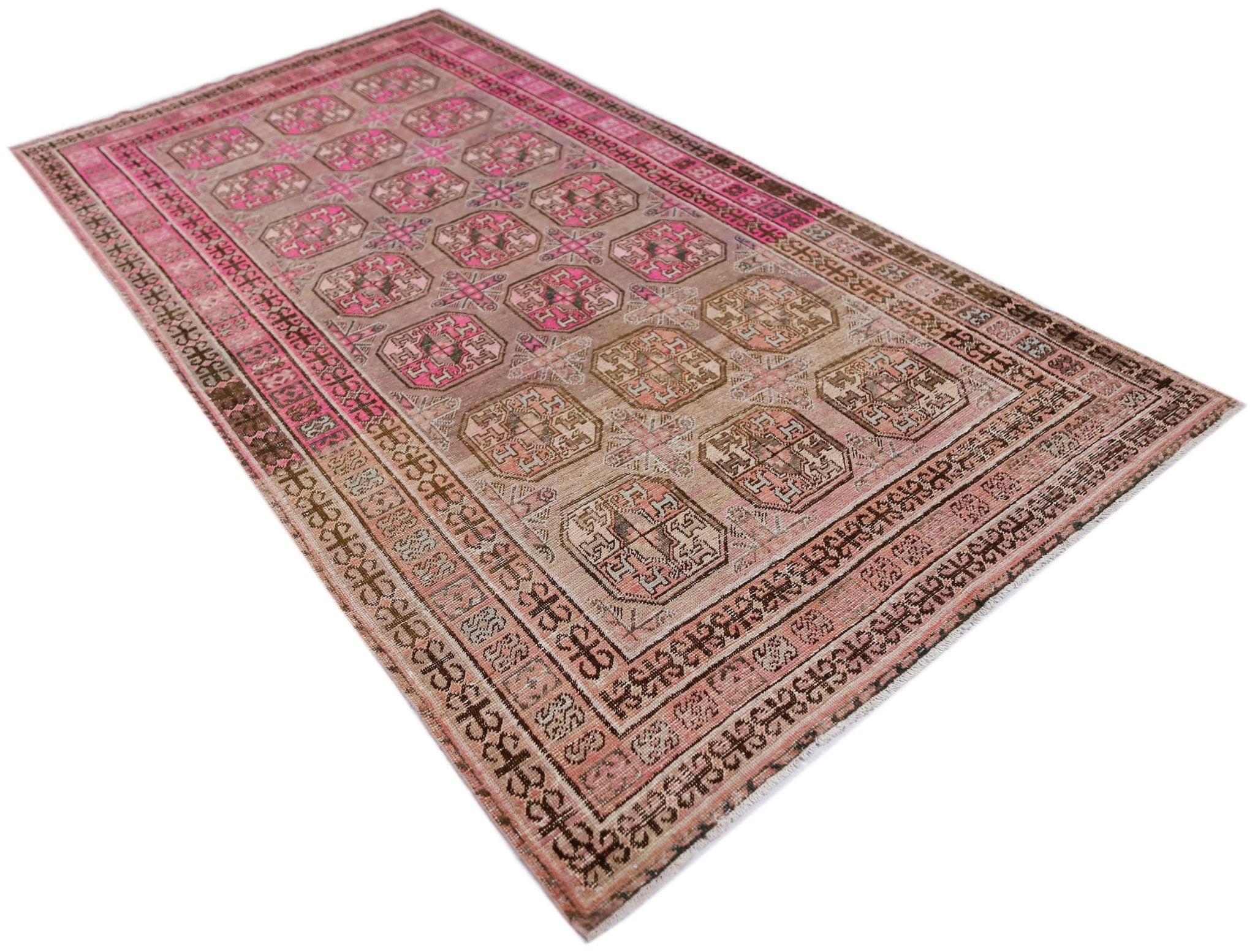 An antique handwoven Afghan Turkmen rug featuring a repeating geometric pattern in pink and brown.