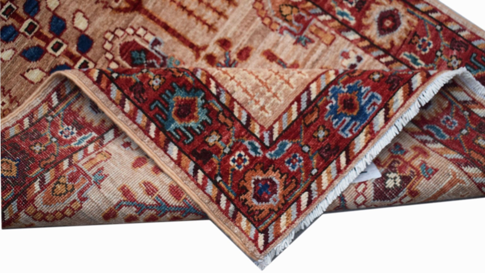 A handmade Afghan Chobi runner featuring a traditional Tree of Life pattern in warm earth tones.