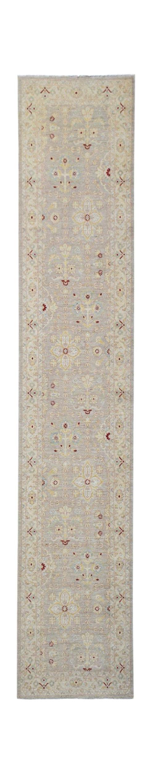 A hand-knotted Afghan Chobi runner featuring traditional floral patterns in soft, earthy tones.