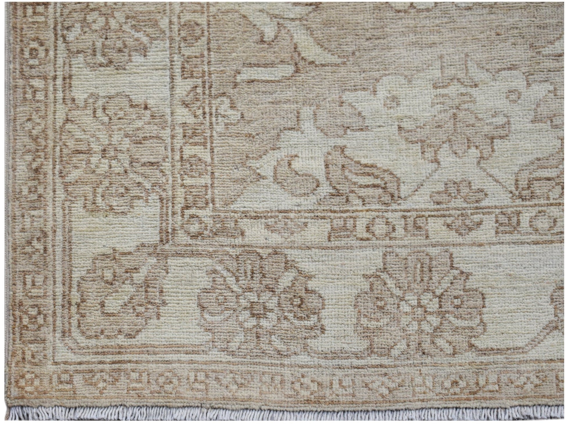 A handwoven Afghan Chobi runner featuring traditional floral patterns in neutral wood tones.