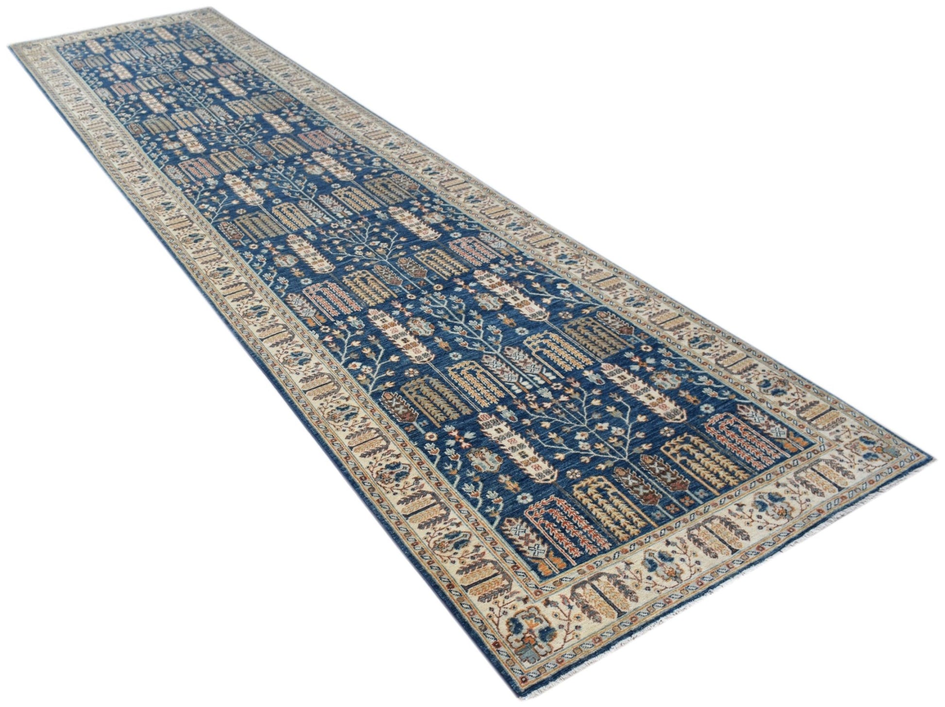 A long, handwoven Afghan Chobi runner featuring a traditional tree of life pattern in blue tones.