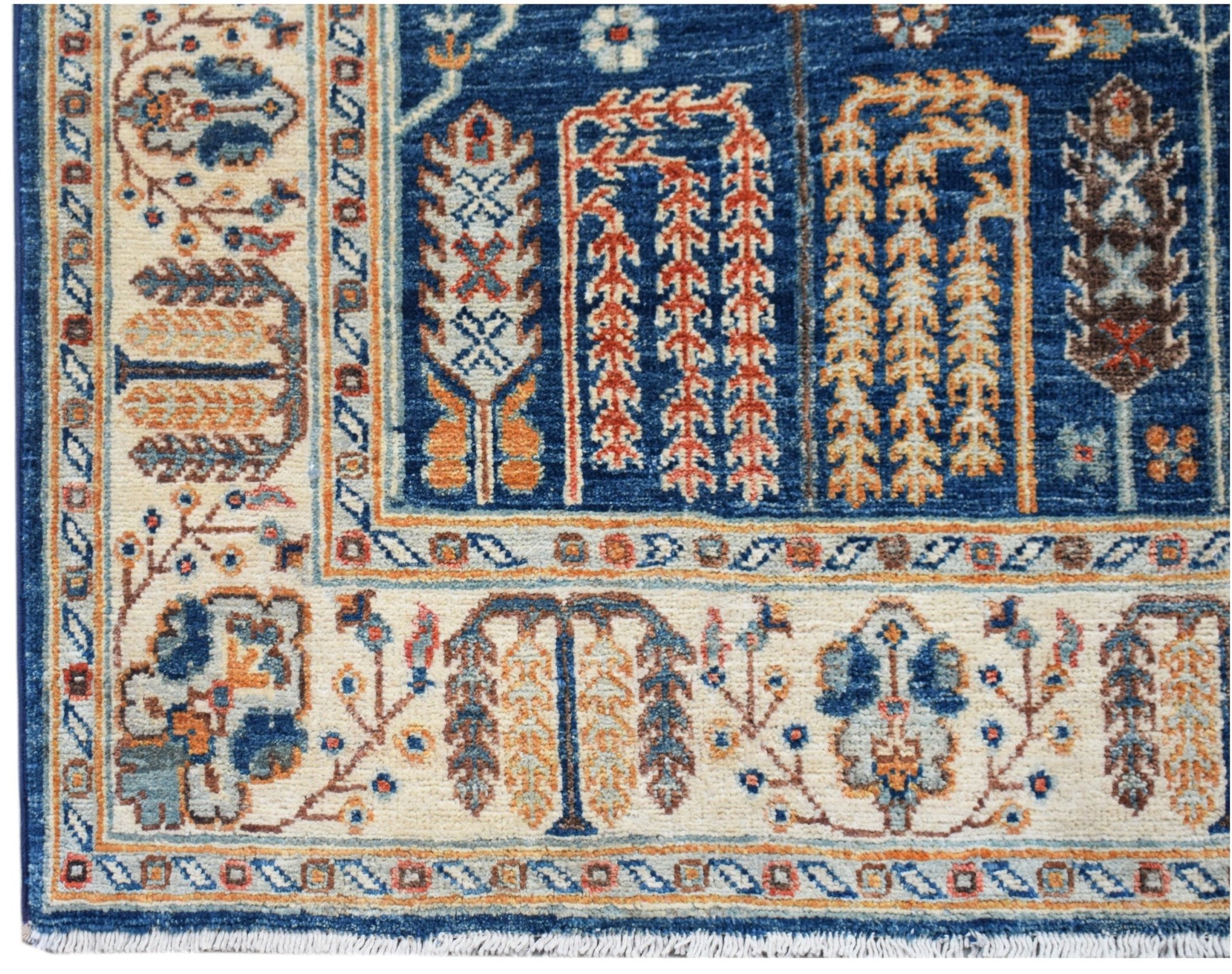 Handwoven Afghan Chobi runner featuring a blue field with a traditional Tree of Life pattern.
