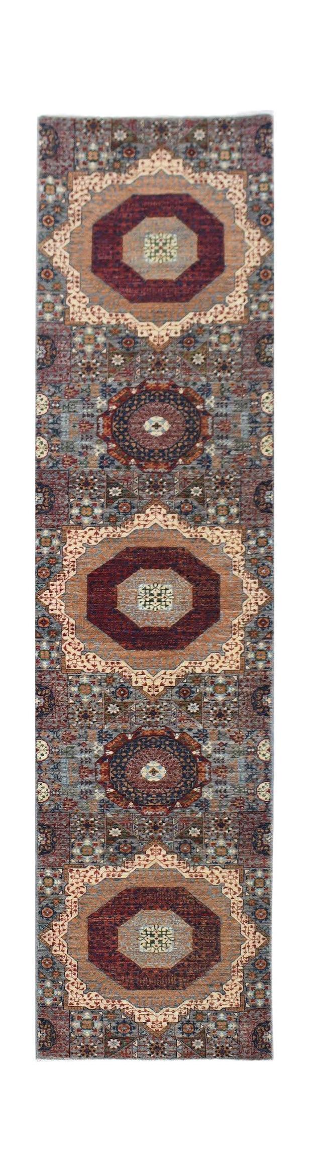 A handmade Afghan Chobi runner featuring a traditional Mamluk pattern with geometric medallions.