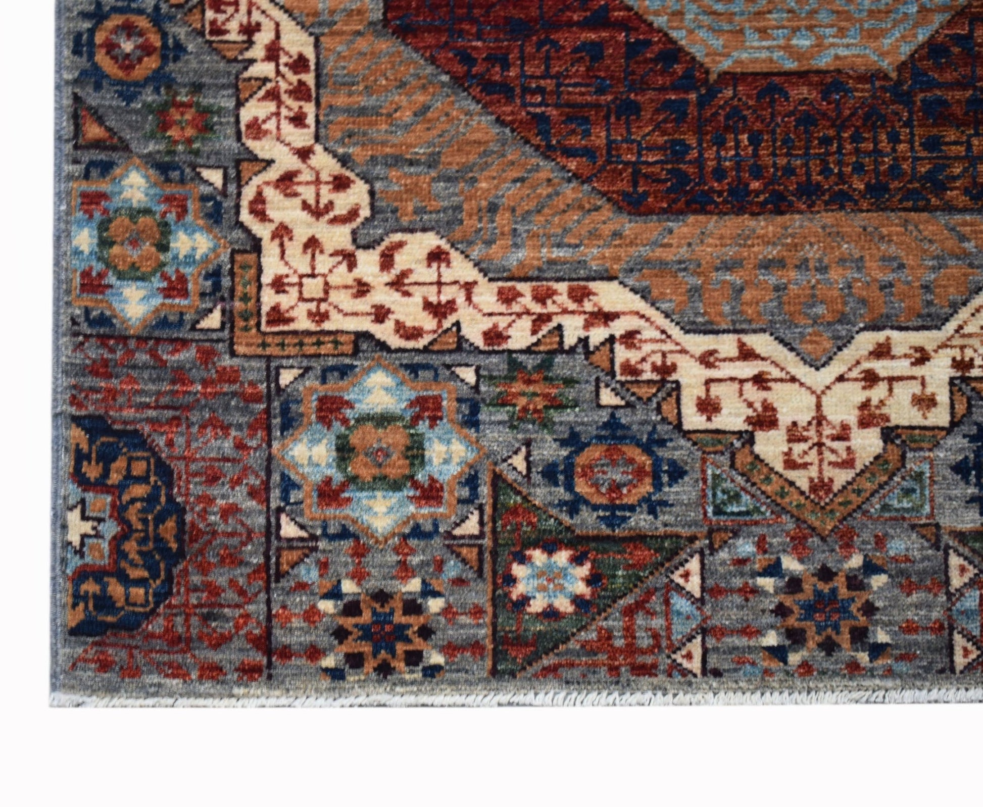 A handmade Afghan Chobi runner featuring a detailed Mamluk pattern in blue, red, and tan tones.
