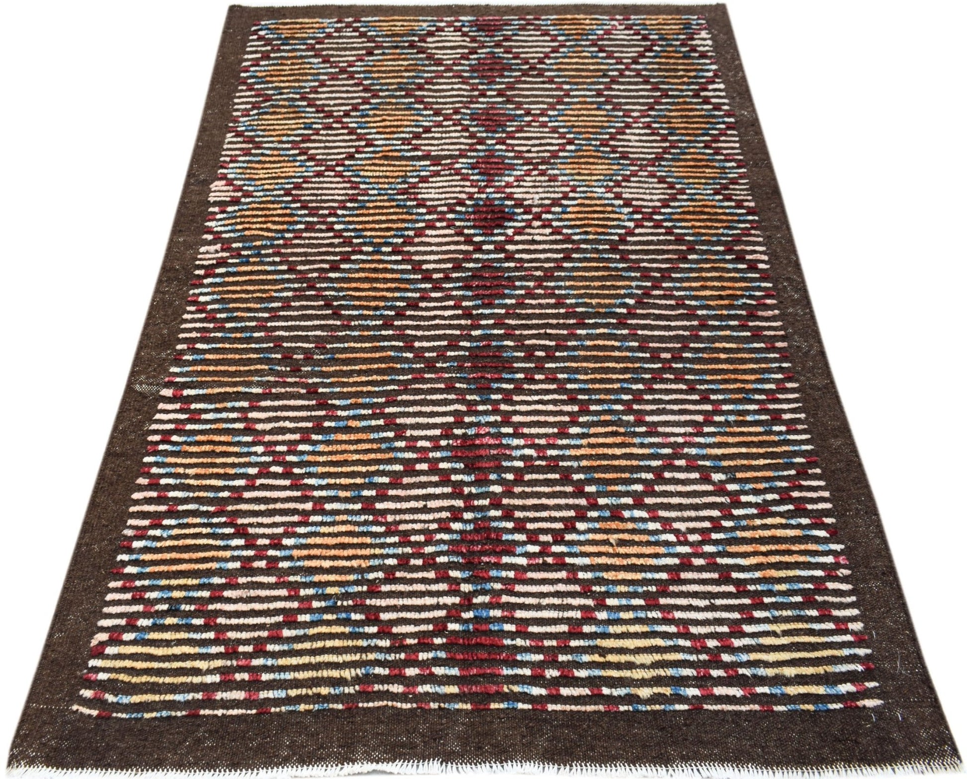A hand-knotted Afghan rug featuring a dark brown background with colorful geometric patterns.