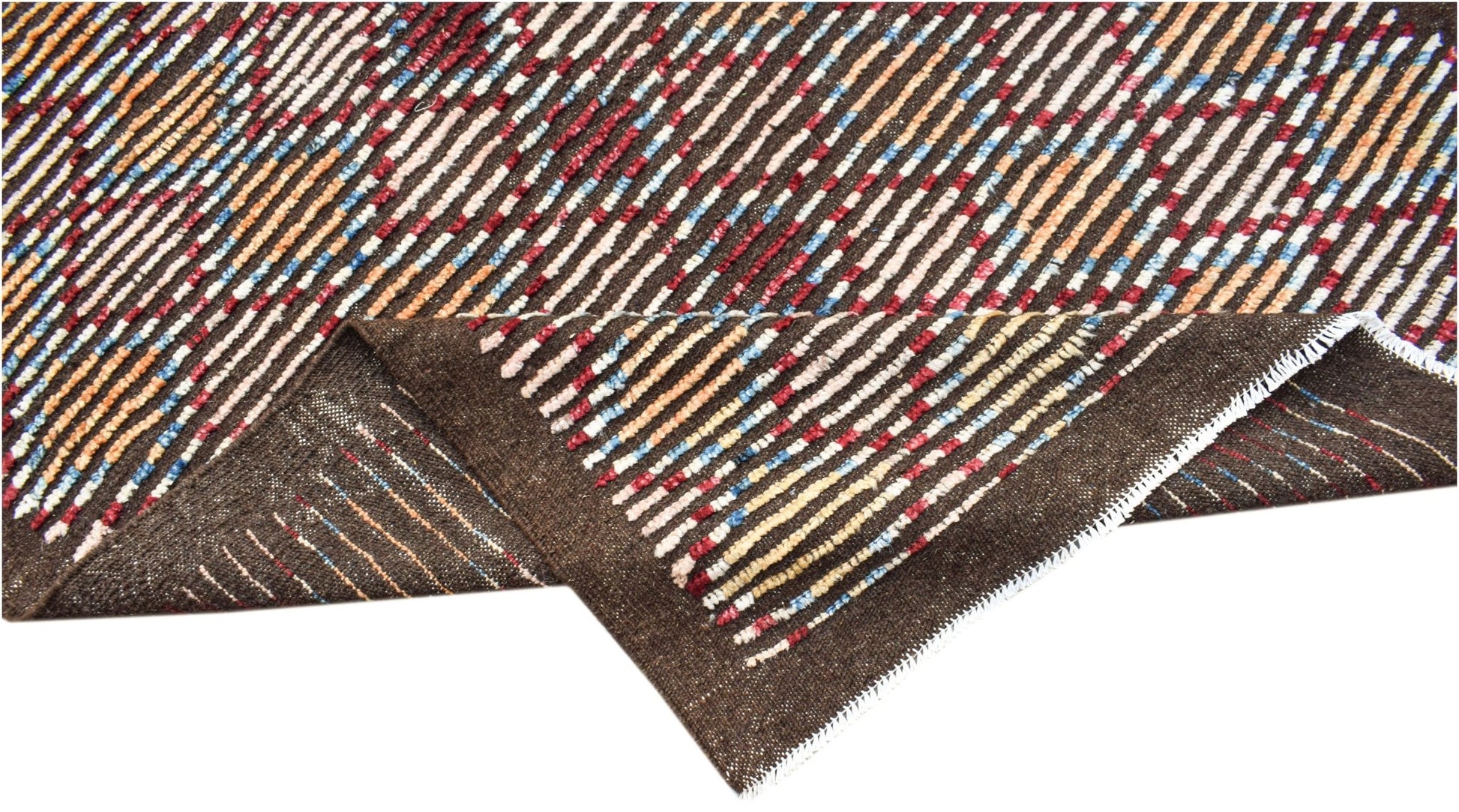 A hand-knotted Afghan rug with a dark brown base and colorful, textured vertical stripes.