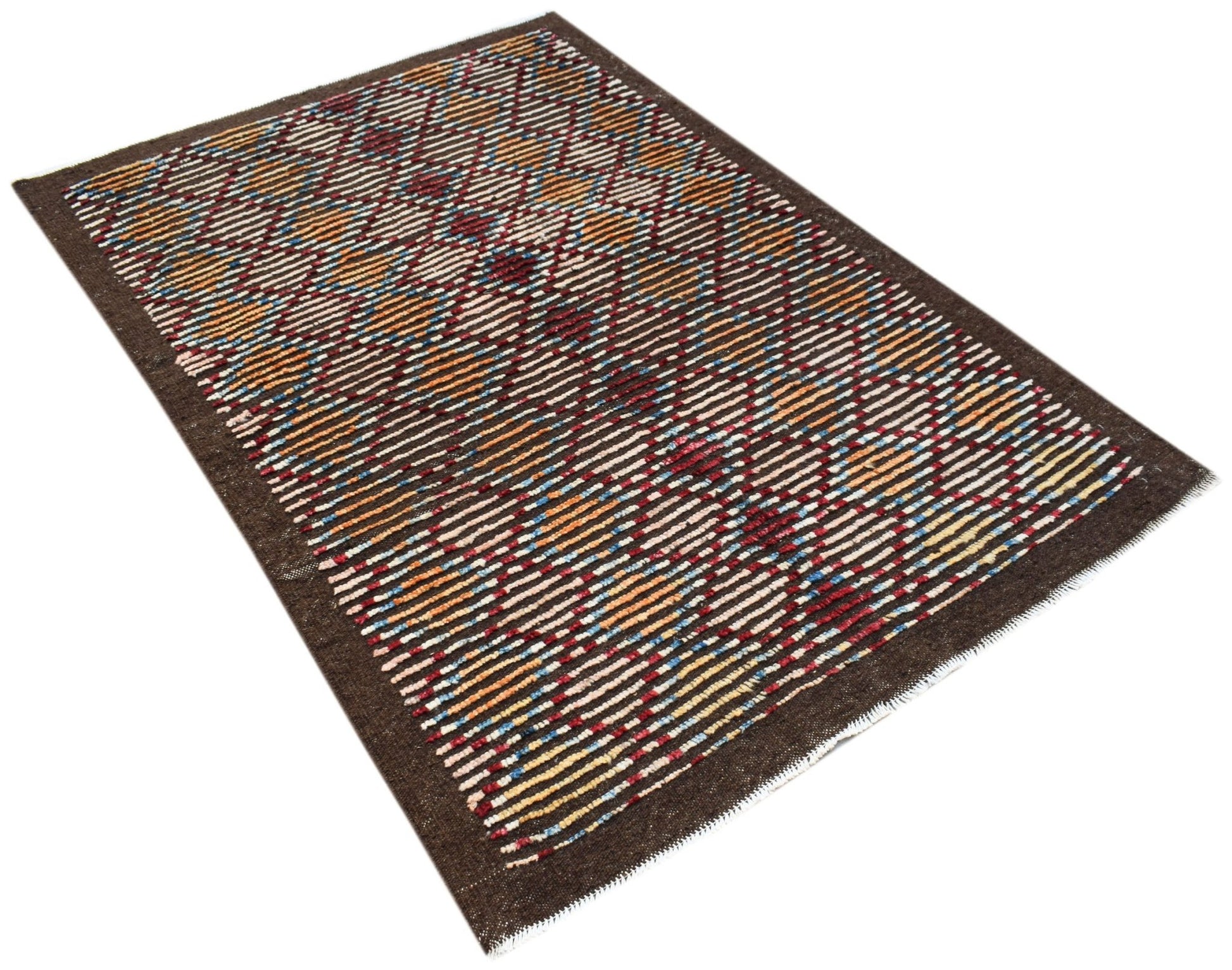 An Afghan Yekta rug featuring a dark brown background with a colorful geometric diamond pattern.