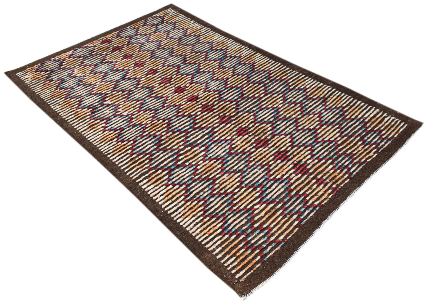 An Afghan Yekta rug featuring a geometric pattern of multicolored stripes on a dark brown background.