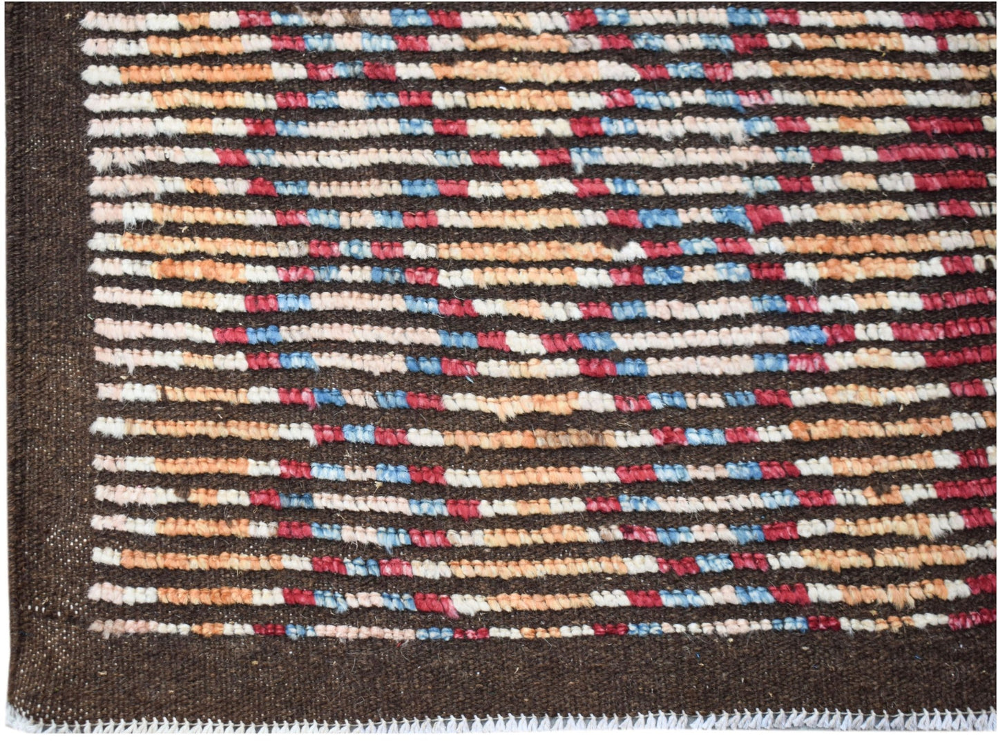 An Afghan Yekta rug featuring horizontal stripes of blue, red, orange, and white on a brown base.