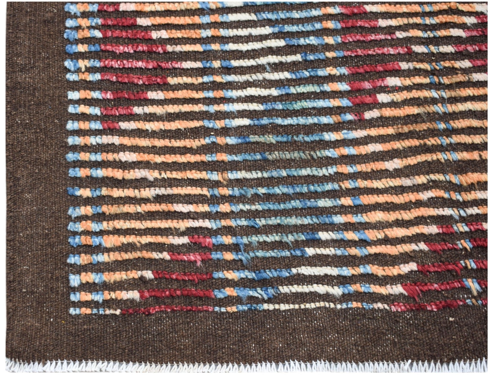 A hand-knotted Afghan rug featuring horizontal stripes of blue, red, and orange on a brown base.