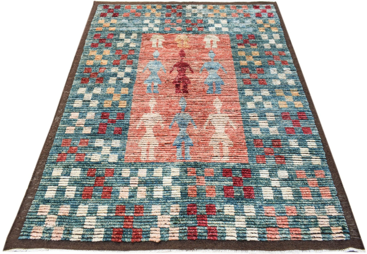 An Afghan Yekta rug featuring a central red panel with stylized figures and a checkered border.
