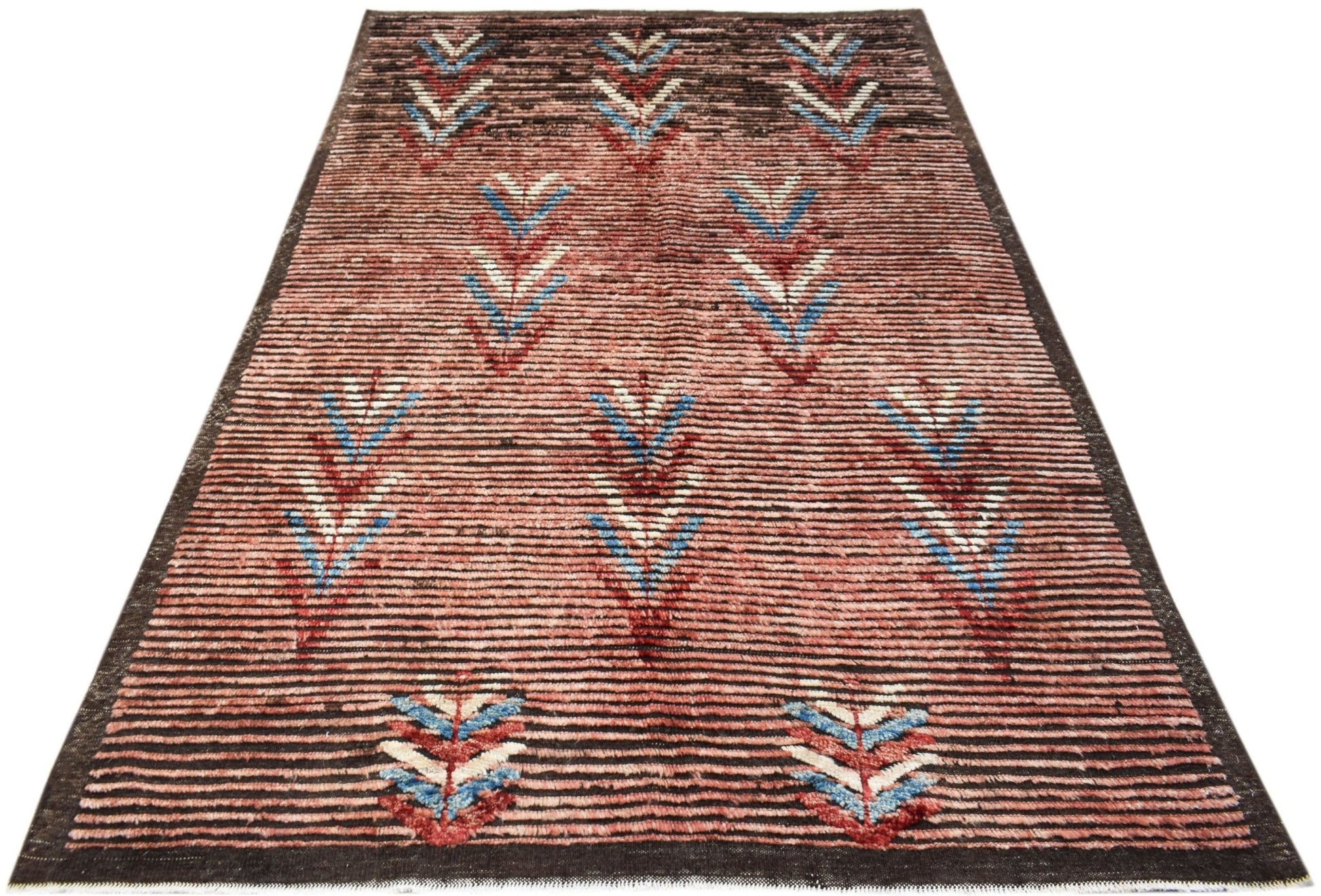 An Afghan Yekta rug featuring a striped reddish-brown background with geometric leaf patterns.
